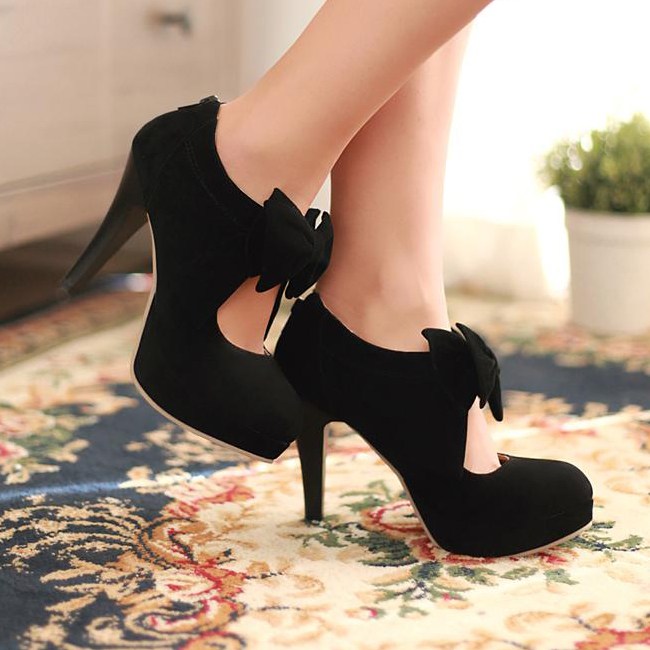 black pumps with a bow